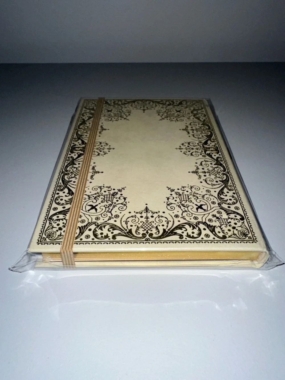 Gilded Ivory gold-foiled embossed cover gilded pages elastic closure journal